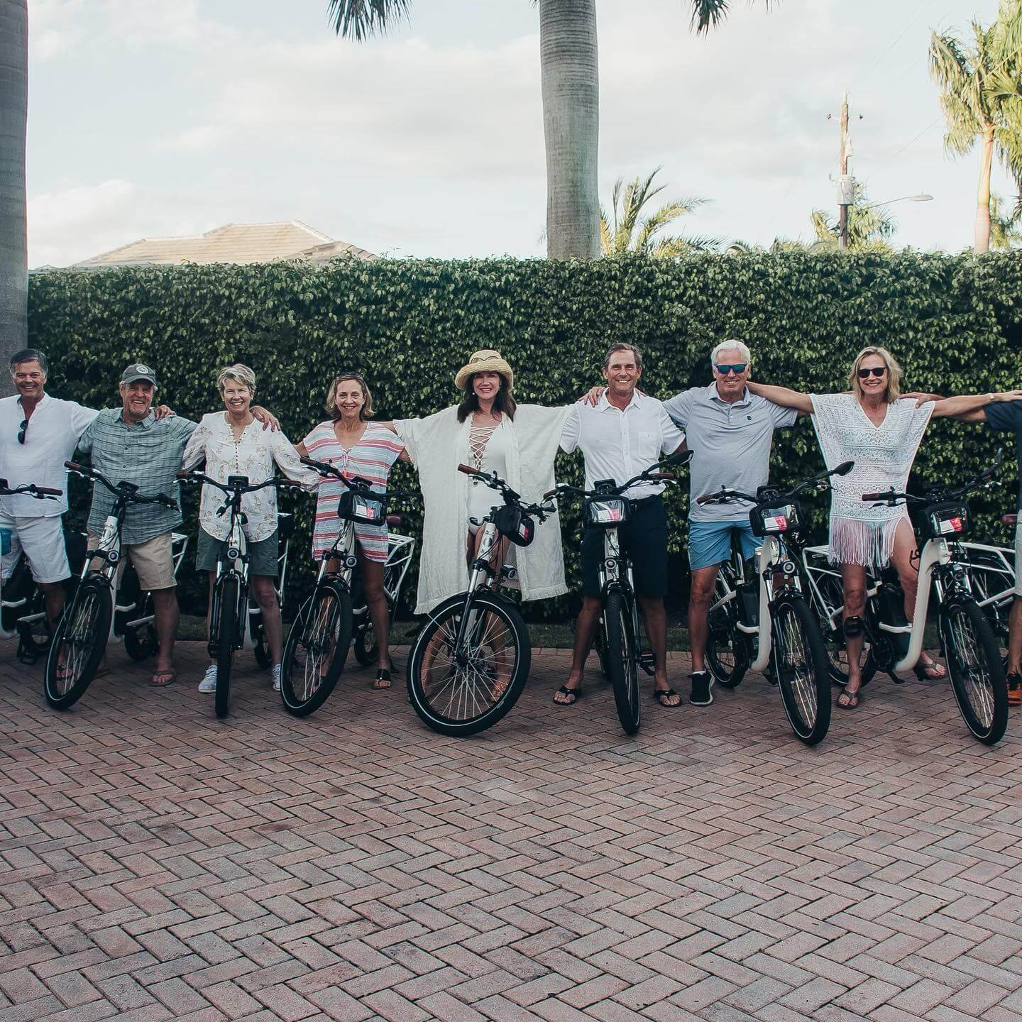 A group of riders lined up with their rental ebikes before a Naples ride